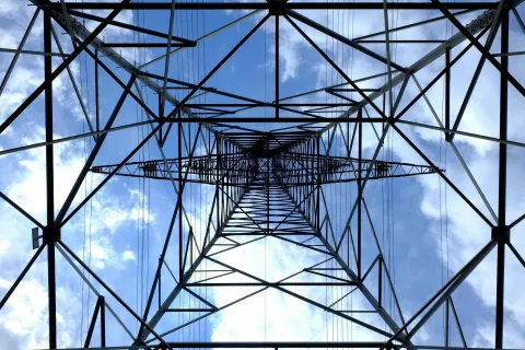 low angle black metal tower pylon electricity national grid