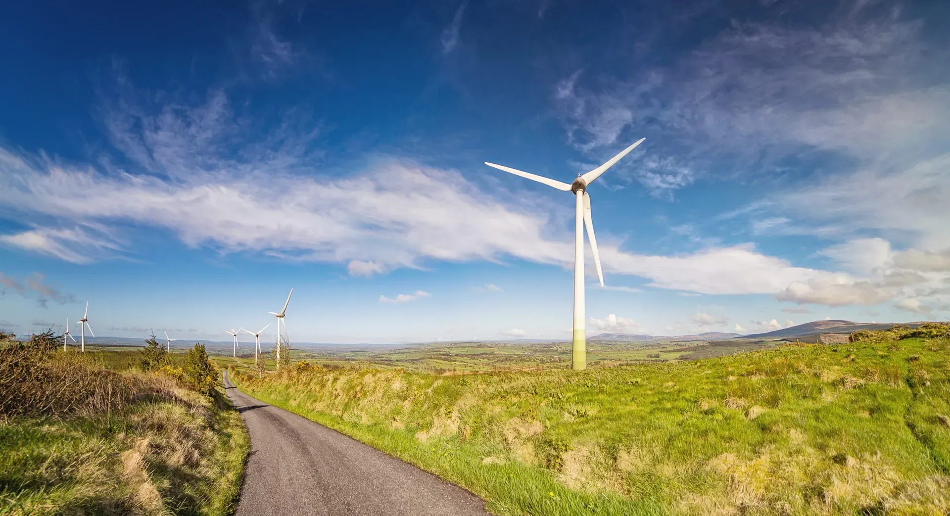 Landscape with windmills on a blue sky in a county Cork. Boggeragh Mountains, Ireland.